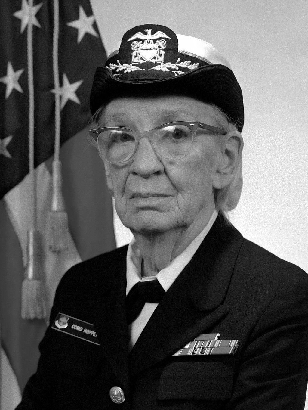 Grace Hopper working with computing equipment